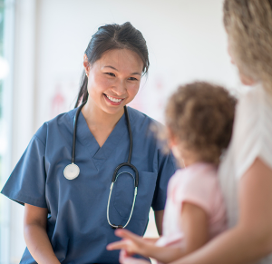 nurse introducing herself to pediatric patient