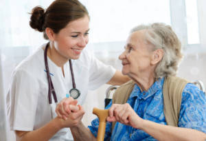 Senior woman with her home caregiver.